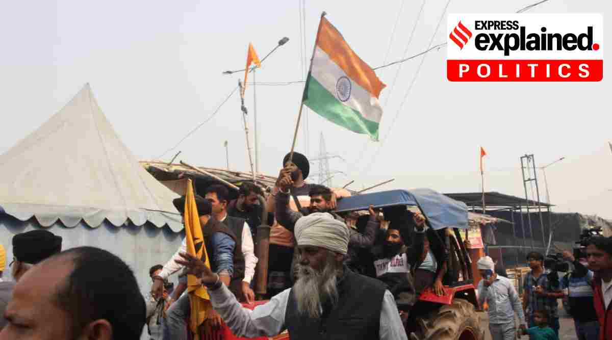 Farmers celebrate after the farm laws are repealed, at Ghazipur border in New Delhi on Friday. (Express Photo: Amit Mehra)