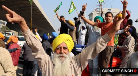 Celebrations by the farmers at one of the protest sites on Ferozepur Road in Ludhiana after farm laws were repealed on Friday. (Express Photo by Gurmeet Singh)