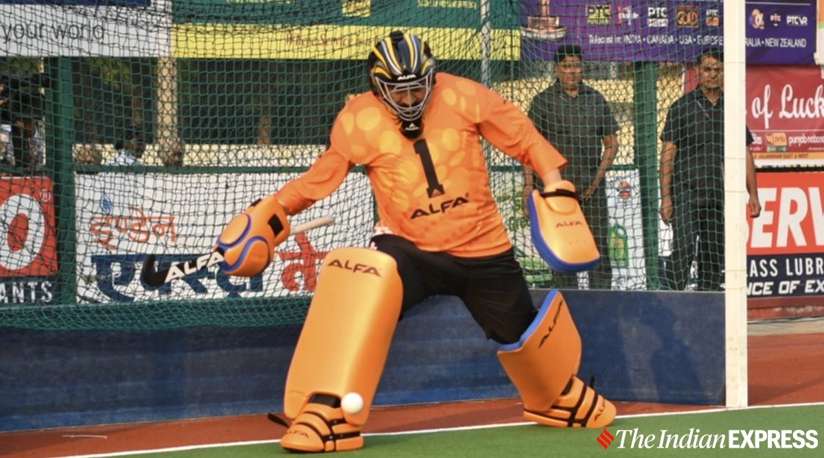 Punjab Chief Minister Charanjit Singh Channi  plays hockey during 38th Olympian Surjit Hockey Tournament, in Jalandhar, Sunday. (Express photo)