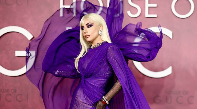 lady gaga cape dress weaves magic in a sheer gown at 'House of Gucci' premiere | Fashion News lady gaga purple outfit