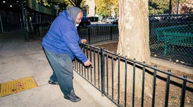 Daniel Barber pointing to evidence of nesting rats, at the Andrew Jackson Houses in the Bronx, Oct. 19, 2021. Bold rodents are among New YorkÕs permanent features. But across the city, many believe they are running amok like never before. (Jutharat Pinyodoonyachet/The New York Times)