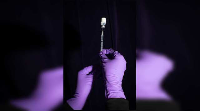 A health care worker administers a COVID-19 vaccine at a former JCPenney in Poughkeepsie, N.Y., April 29, 2021. (Sinna Nasseri/The New York Times)
