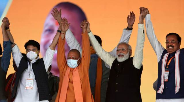 PM Modi with Scindia, Adityanath and Keshav Maurya at the foundation-laying ceremony of the airport. (Express photo by Gajendra Yadav)