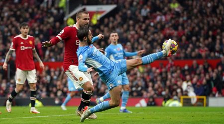 Manchester City's Bernardo Silva scores his side's second goal during the English Premier League soccer match between Manchester United and Manchester City at Old Trafford stadium in Manchester, England, Saturday, Nov. 6, 2021. (Martin Rickett/PA via AP)