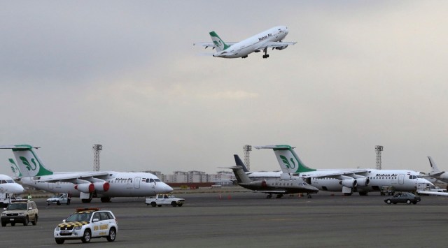 A Mahan Air passenger plane takes off from Mehrabad Airport in Tehran, Iran, Feb. 7, 2016. A cyberattack on Sunday, Nov. 21, 2021, disrupted access to Iran's privately owned Mahan Air, state TV reported, marking the latest in a series of cyberattacks on Iranian infrastructure that has put the country on edge. (AP Photo)