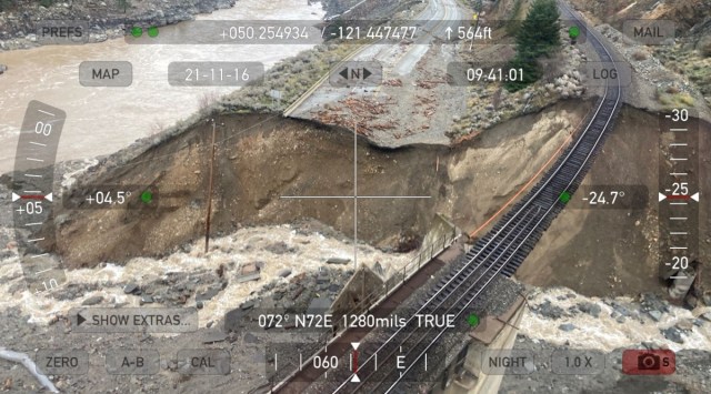 Railway tracks are suspended above the washed out Tank Hill underpass of the Trans Canada Highway 1 after devastating rain storms caused flooding and landslides, northeast of Lytton, British Columbia, Canada November 17, 2021. B.C. (Reuters)