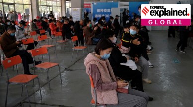 People wait at an observation area after receiving Covid-19 vaccine in Beijing, China. (Reuters)