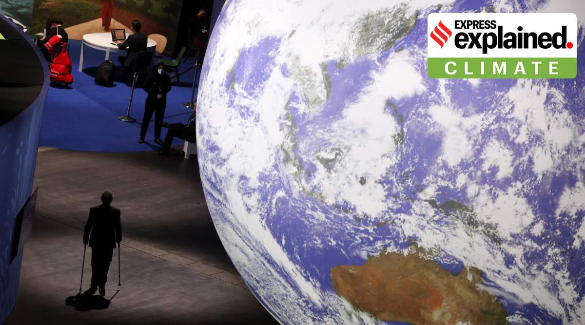 A person walks at the venue of the UN Climate Change Conference (COP26) in Glasgow, Scotland, Britain, November 9, 2021. (Reuters)