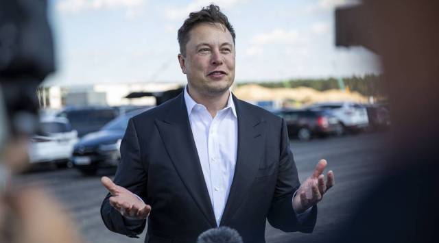Elon Musk had previously said he would have to exercise a large number of stock options in the next three months, which would create a big tax bill. (Image source: Bloomberg)