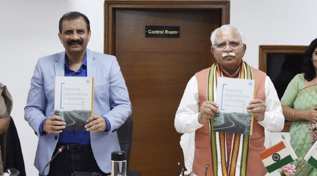 Vijay Vardhan with Haryana CM Manohar Lal Khattar. (Twitter/DiprHaryana)