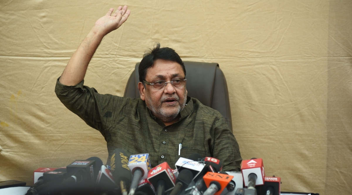 Minister Nawab Malik during a press conference at Kurla, in Mumbai (Express Photo)

