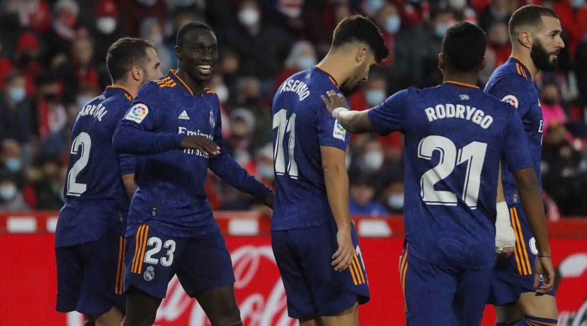 Vinicius Junior of Real Madrid celebrates a goal with Ferland