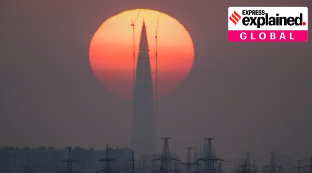 The Lakhta Centre tower under construction, the headquarters of Russian gas monopoly Gazprom, is silhouetted against the sunset in St. Petersburg, Russia. (AP)