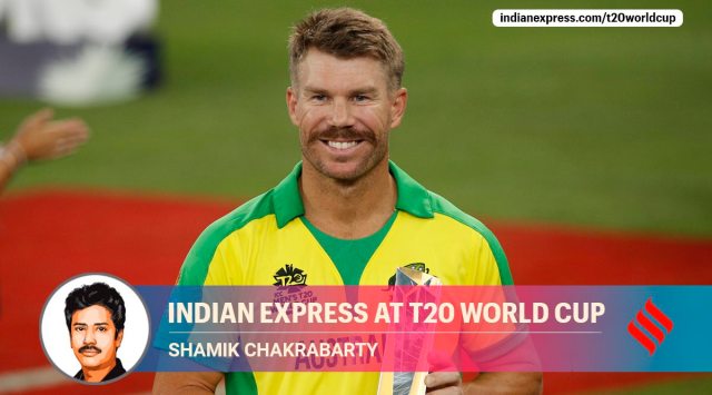 Australia's David Warner poses with the player of the tournament trophy (Source: Reuters)