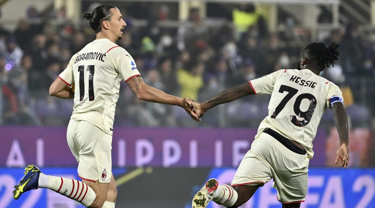 Milan's Zlatan Ibrahimovic, left, celebrates after scoring a goal during the Italian Serie A soccer match between Fiorentina and Milan, at the Artemio Franchi stadium in Florence (Source: AP)