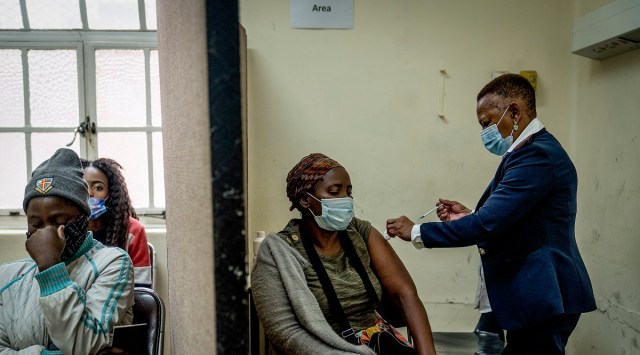 A woman is vaccinated against Covid-19 at the Hillbrow Clinic in Johannesburg. (AP)