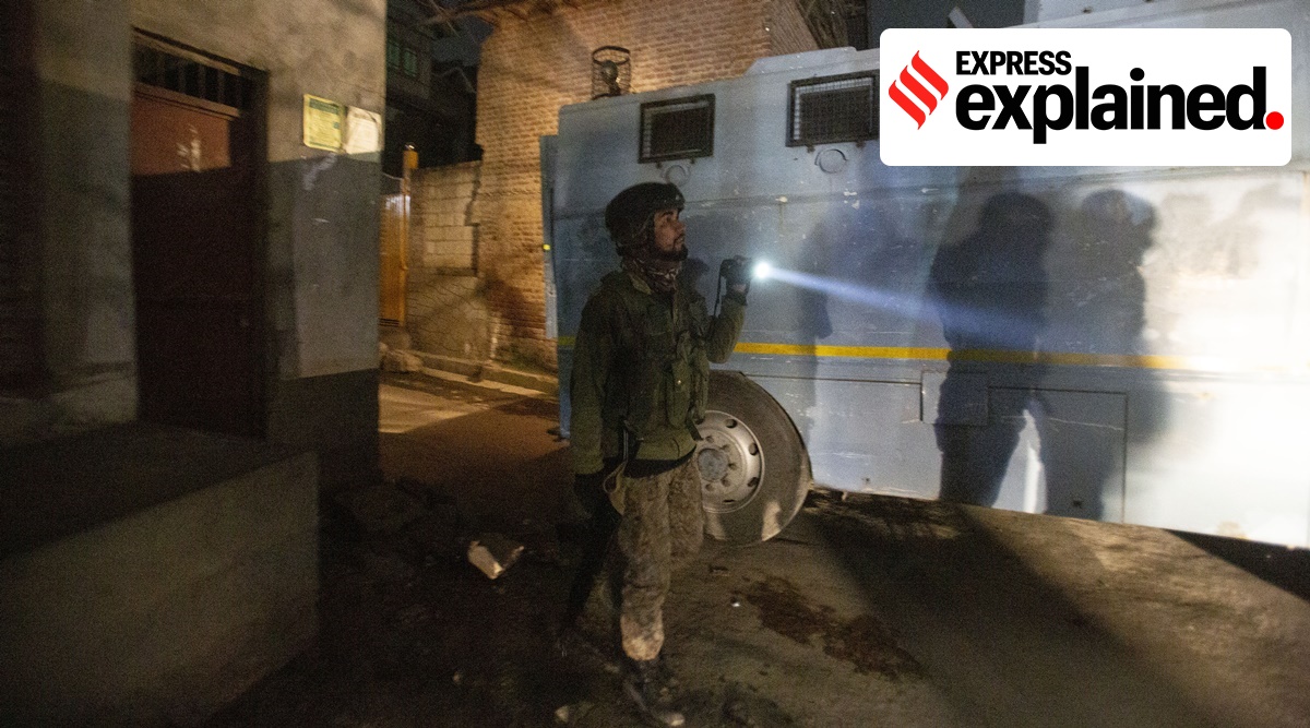 A soldier guards near the site of an attack on the outskirts of Srinagar (AP)