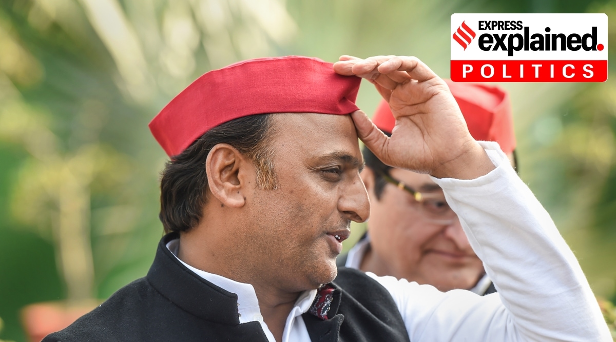 New Delhi: Samajwadi Party President Akhilesh Yadav wearing party cap walks towards the Mahatma Gandhi's statue at Parliament in New Delhi. (PTI)