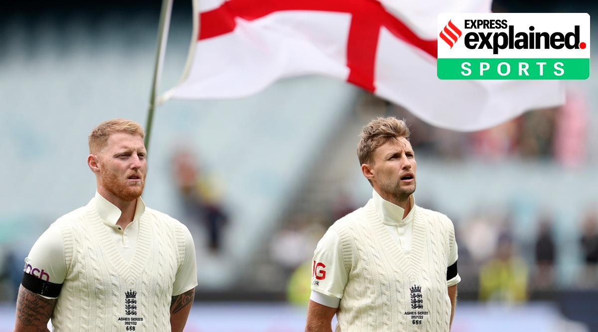 England's Joe Root, right, and Ben Stokes stand for the anthems at the start of their cricket test match in Melbourne, Australia, Sunday, Dec. 26, 2021. (AP)