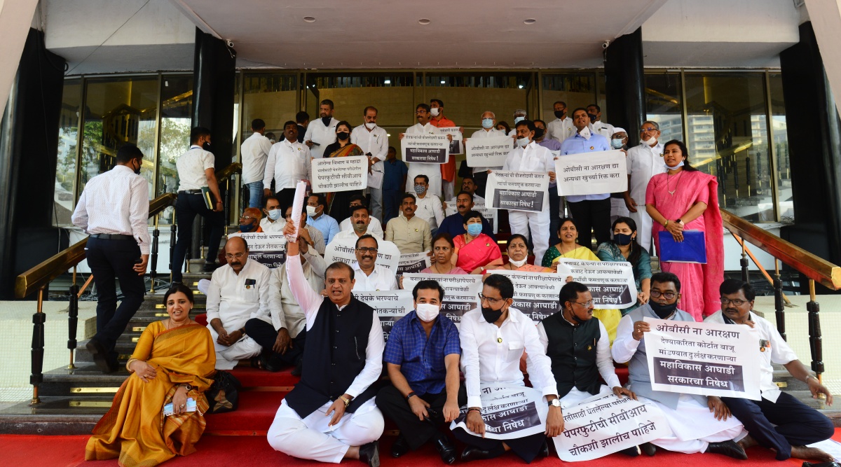 Opposition party leaders and members protest at the Assembly gate in Mumbai. (Express Photo by Ganesh Shirsekar)