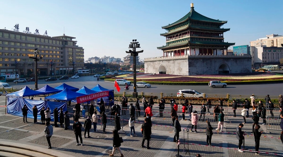 Residents line up for tests at a Covid-19 testing site in Xi'an in northwestern China's Shaanxi Province. (AP)