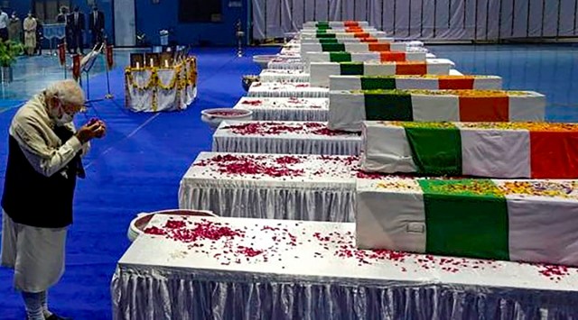 Prime Minister Narendra Modi pays tribute to those killed in the IAF chopper crash. Their bodies were flown down to the Palam air base in New Delhi. (File Photo: PTI)
