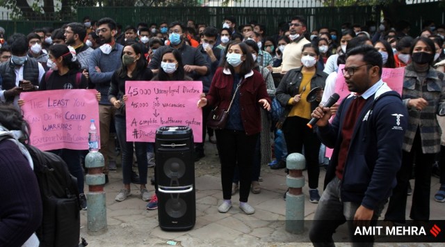 Resident doctors from government hospitals during a protest outside the Health Ministry's office in New Delhi on Thursday. (Express Photo: Amit Mehra)