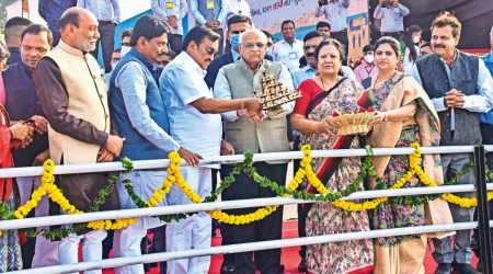 CM Bhupendra Patel, BJP president CR Patil, MP Darshnaben Jardosh and MLAs join hands and pray to River Tapi as part of  'Nadi Utsav', in Surat. (Photo: PTI)
