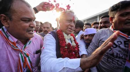 Newly appointed Gujarat Congress president Jagdish Thakor being welcomed by party workers at the Sardar Vallabhbhai Patel Airport in Ahmedabad on Friday. Express photo by Nirmal Harindran