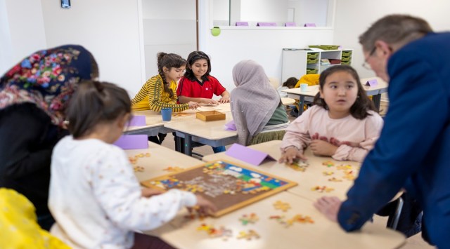 Afghan children attend a school in Nijmegen, in the Netherlands, on Oct. 21, 2021.  (Ilvy Njiokiktjien/The New York Times)