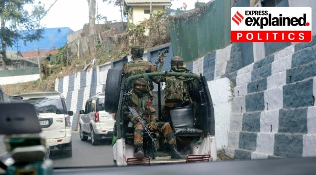 An Indian Army convoy travels through Kohima on Sunday. (Photo: AP)