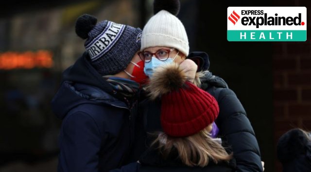 A mother hugs her children as they wait in line for a Covid-19 test as the Omicron coronavirus variant continues to spread in Manhattan, New York City, U.S., December 22, 2021. (Reuters Photo: Andrew Kelly)
