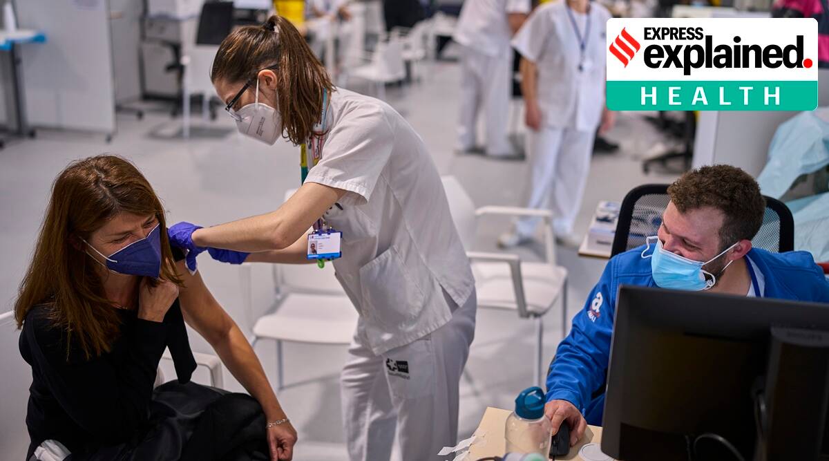 A woman receives the Moderna vaccine during a COVID-19 vaccination at the Isabel Zendal Hospital in Madrid, Spain. (AP)