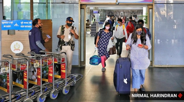 At the arrival gate of the domestic terminal of Ahmedabad airport. (Express photo by Nirmal Harindran)