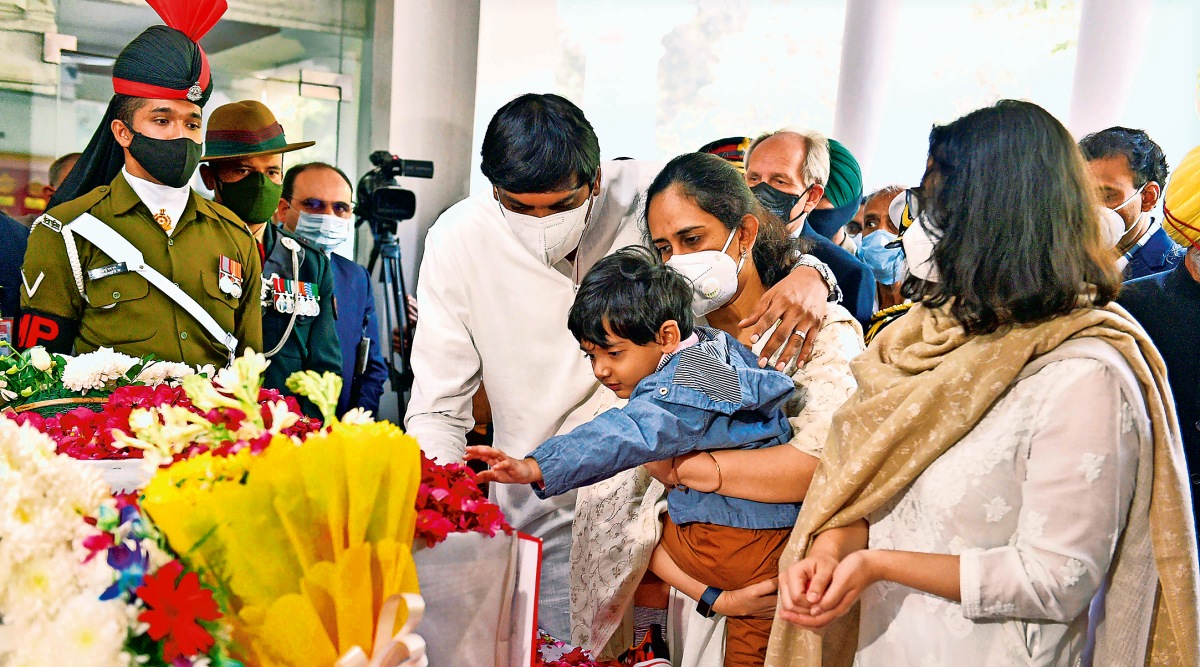 Daughters, grandson of CDS Gen Bipin Rawat and his wife, Madhulika, pay their last respects at their home in New Delhi. (Source: PTI)