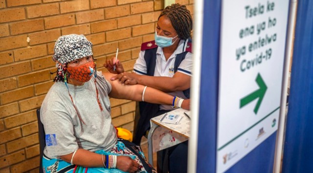 An Orange Farm, South Africa, resident receives her jab against COVID-19 at the Orange Farm multipurpose center. (AP)
