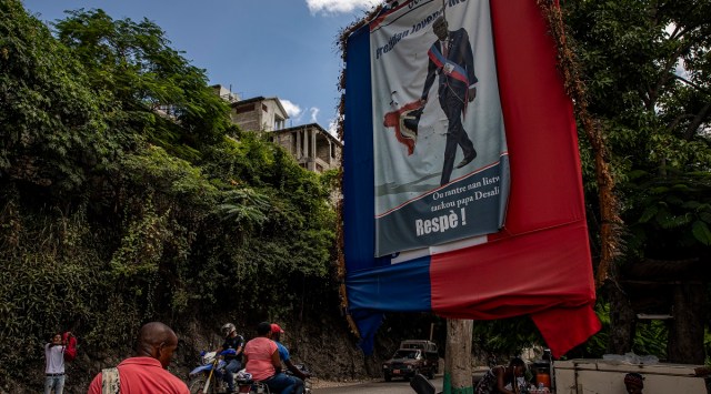 A sign depicts Haiti's assassinated president, Jovenel Moise, near his home in Port-au-Prince on September 10, 2021. American policy decisions are vital to understanding Haiti's political instability, and why it remains the poorest country in the Western Hemisphere. (Adriana Zehbrauskas/The New York Times)