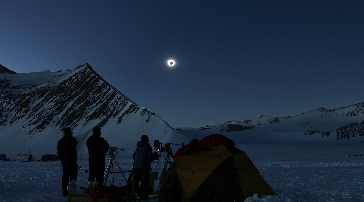 People view a total solar eclipse from Polar Union Glacier Camp in Antarctica. (AP)