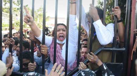 Assam Pradesh Congress Committee (APCC) members stage a protest demanding resignation of Chief Minister Himanta Biswa Sarma after reports emerged that a firm co-founded by his wife had acquired government land intended for use by landless persons and institutions, in Guwahati, Friday, Dec. 17, 2021. (PTI Photo)