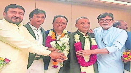 Jagdish Thakor and Rathva being welcomed at the party office in Gandhinagar. Express photo