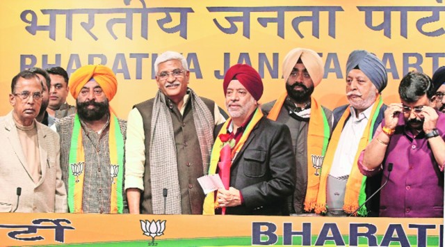 Senior Akali leader Sarabjit Singh Makkar (left) and former Punjab DGP Sarbdeep Singh Virk (extreme right) and other leaders being welcomed into the BJP by Union Minister Gajendra Singh Shekhawat in New Delhi on Friday. Photo: Amit Mehra