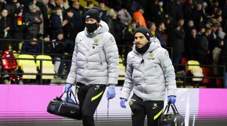 Chelsea medical staff are seen walking on the pitch after attending a medical emergency in the stands (Source: Reuters)