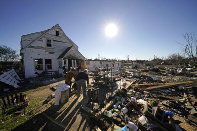 Kentucky authorities said the sheer level of destruction was hindering their ability to tally the damage from Friday night's storms. (AP)