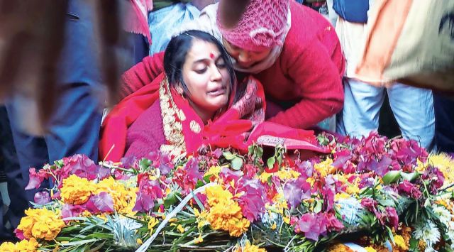 Wife of Lance Naik Vivek Kumar during his funeral in in Himachal Pradesh’s Kangra district.