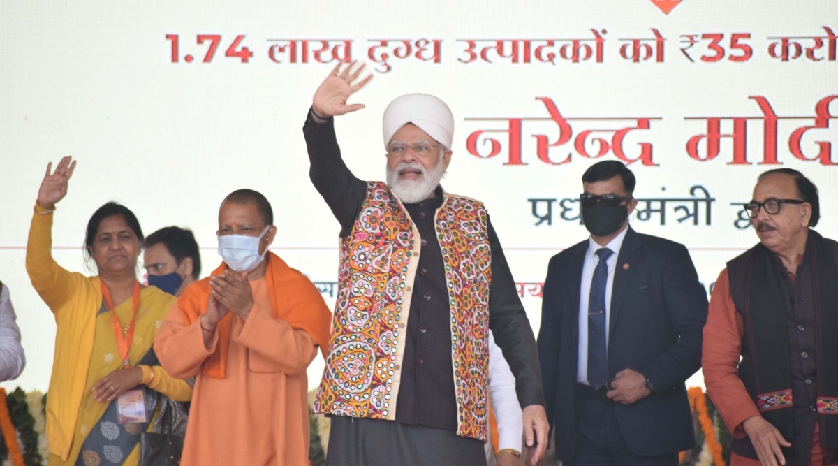 PM Narendra Modi with 
UP CM Yogi Adityanath in Varanasi Thursday. (Anand Singh)