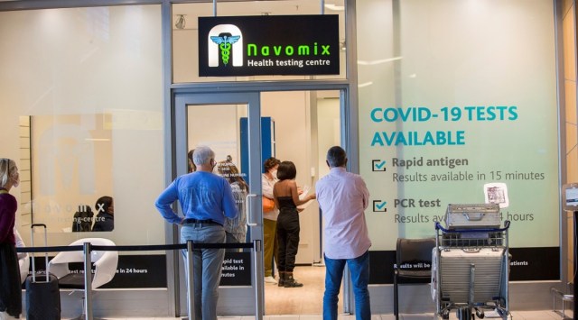Travellers wait to receive Covid-19 tests at Cape Town International Airport in Cape Town, South Africa, on Nov. 29. Photograph via Bloomberg