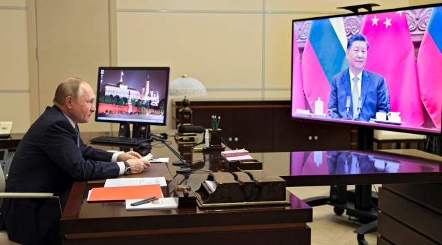 Russian President Vladimir Putin talks with Chinese President Xi Jinping via videoconference at the Novo-Ogaryovo residence outside Moscow, Russia Dec 15, 2021. (AP/PTI)