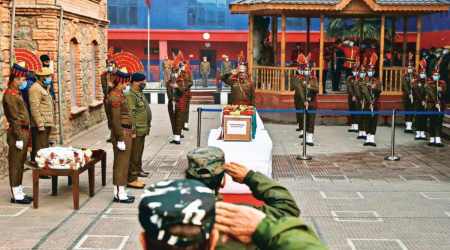 Policemen pay tribute to constable Rameez Ahmad on Tuesday in Srinagar. (Photo: Reuters)