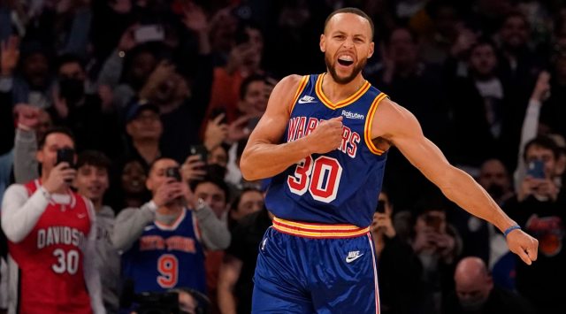 Golden State Warriors guard Stephen Curry reacts after scoring a 3-point basket during the first half of an NBA basketball game against the New York Knicks at Madison Square Garden in New York. Curry hit his 2,974th 3-pointer Tuesday night in the first quarter of the Golden State Warriors' game against the New York Knicks, breaking the record set by Ray Allen. (Source: AP)