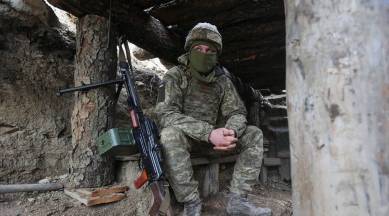Ukrainian soldiers sits in a fighting position on the line of separation from pro-Russian rebels near Debaltsevo, Donetsk region, Ukraine. (AP/File)